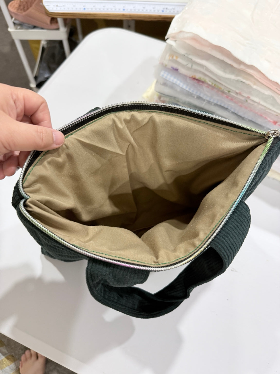 Beige cotton lining inside corduroy carry bag