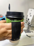 Load image into Gallery viewer, 🥝 kiwi Coffee Cozy – Reusable Kiwiana Cup Sleeve
