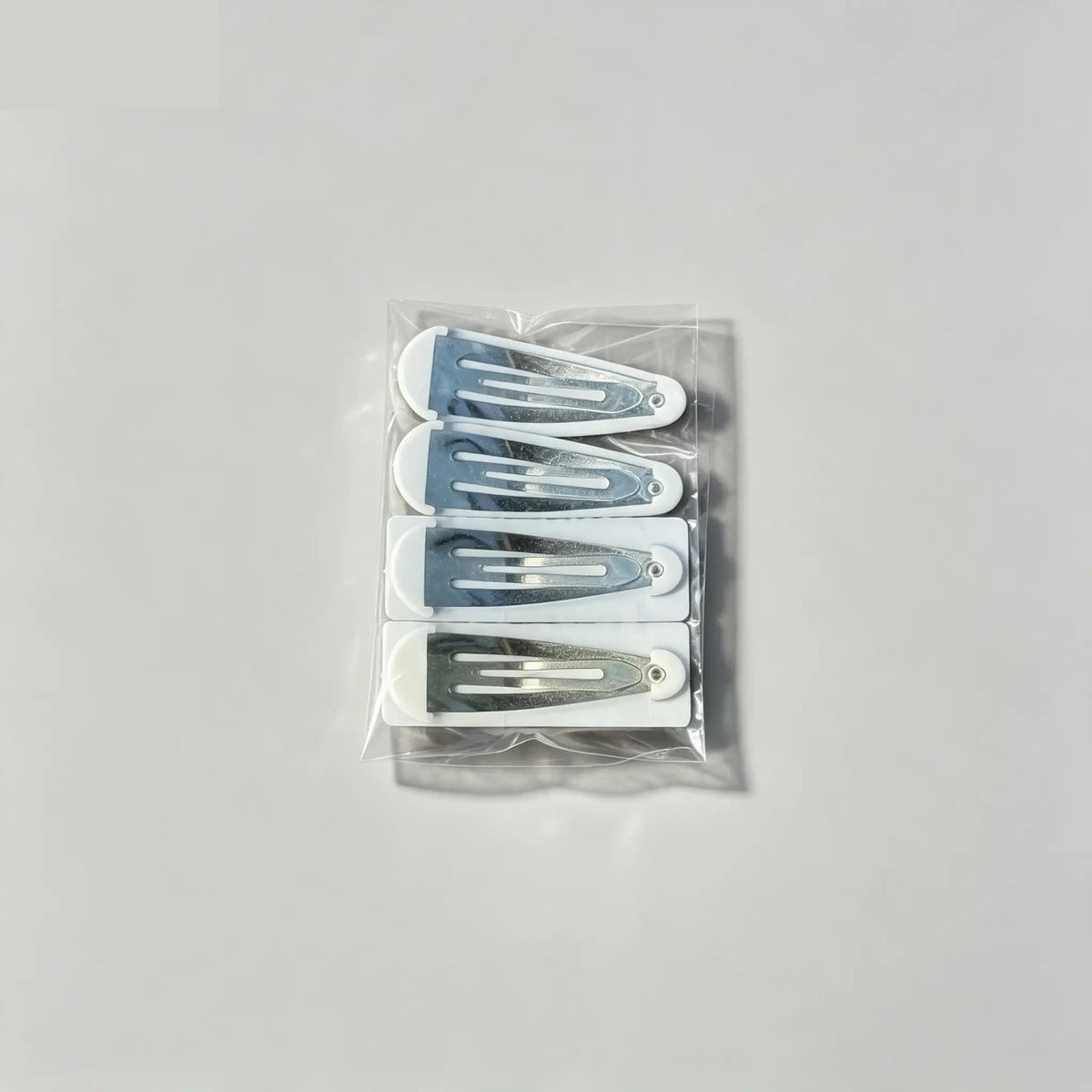 Black and white patterned snap hair clip set, 4 pack back view