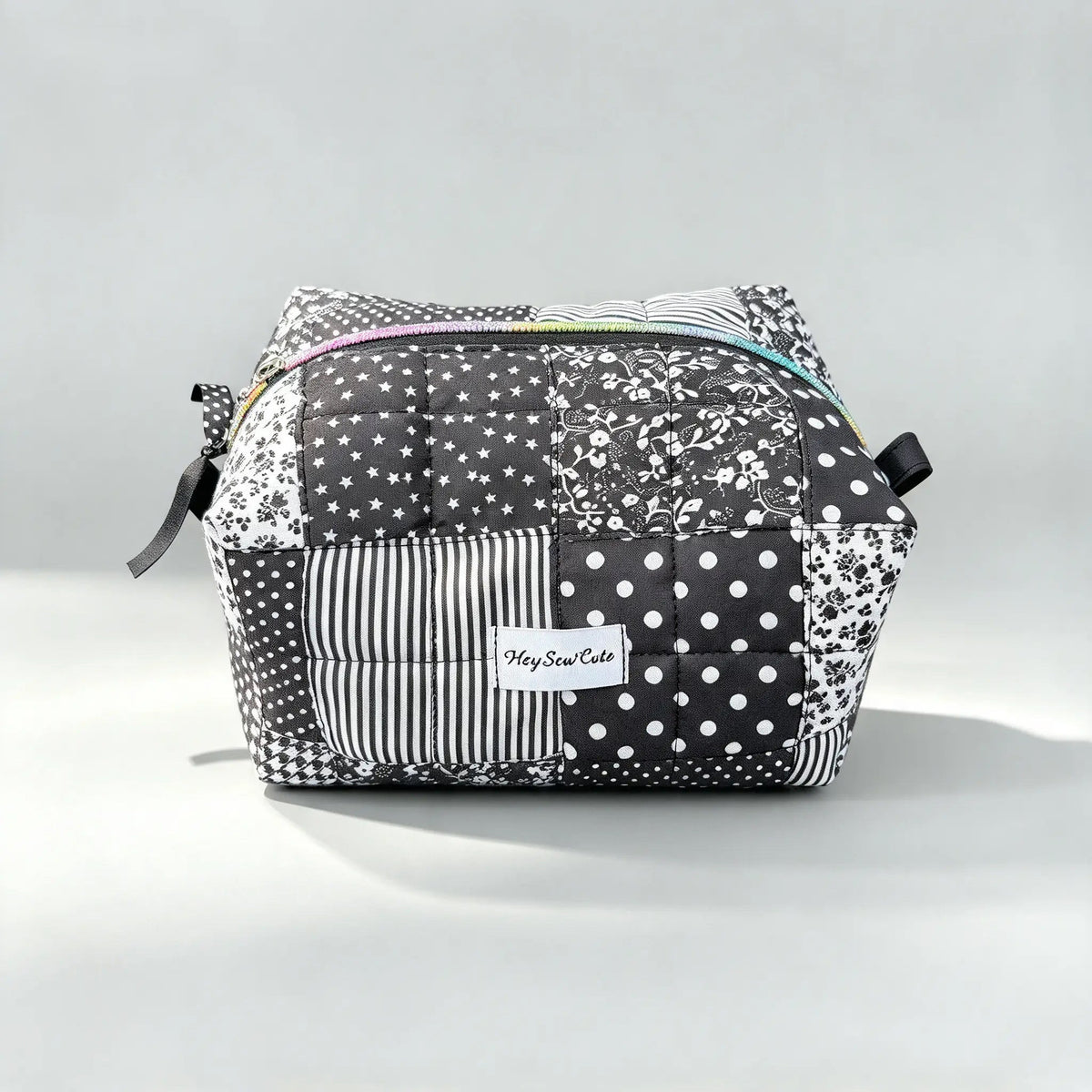 HeySewCute monochrome patchwork quilted pouch studio view 1