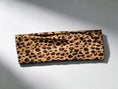 Load image into Gallery viewer, An elastic headband
