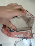 Load image into Gallery viewer, Pink Safari pale cream dotted lining held open by hand

