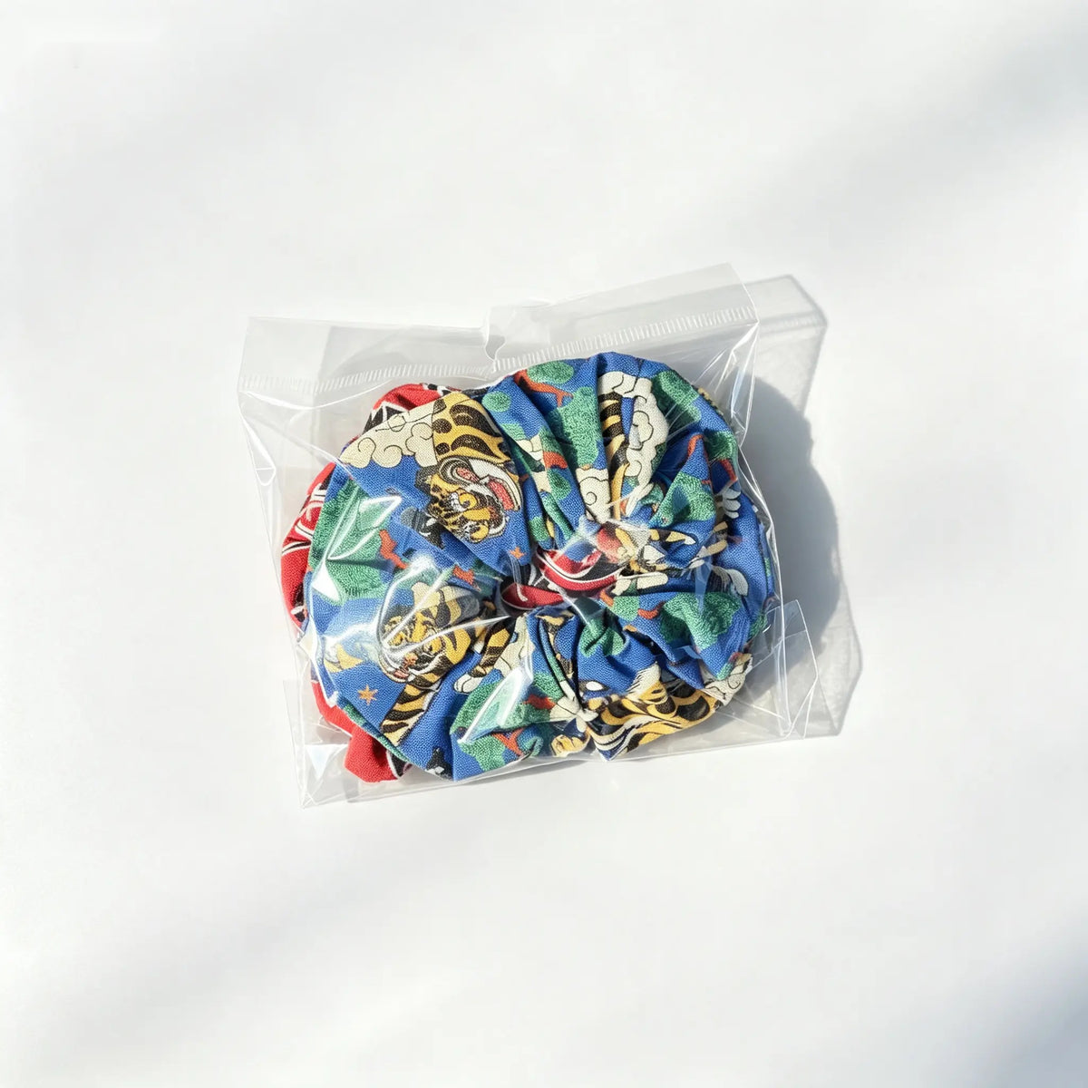 Handmade Kiwiana Scrunchie Duo – Red & Blue back view