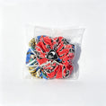 Load image into Gallery viewer, Handmade Kiwiana Scrunchie Duo – Red & Blue front view
