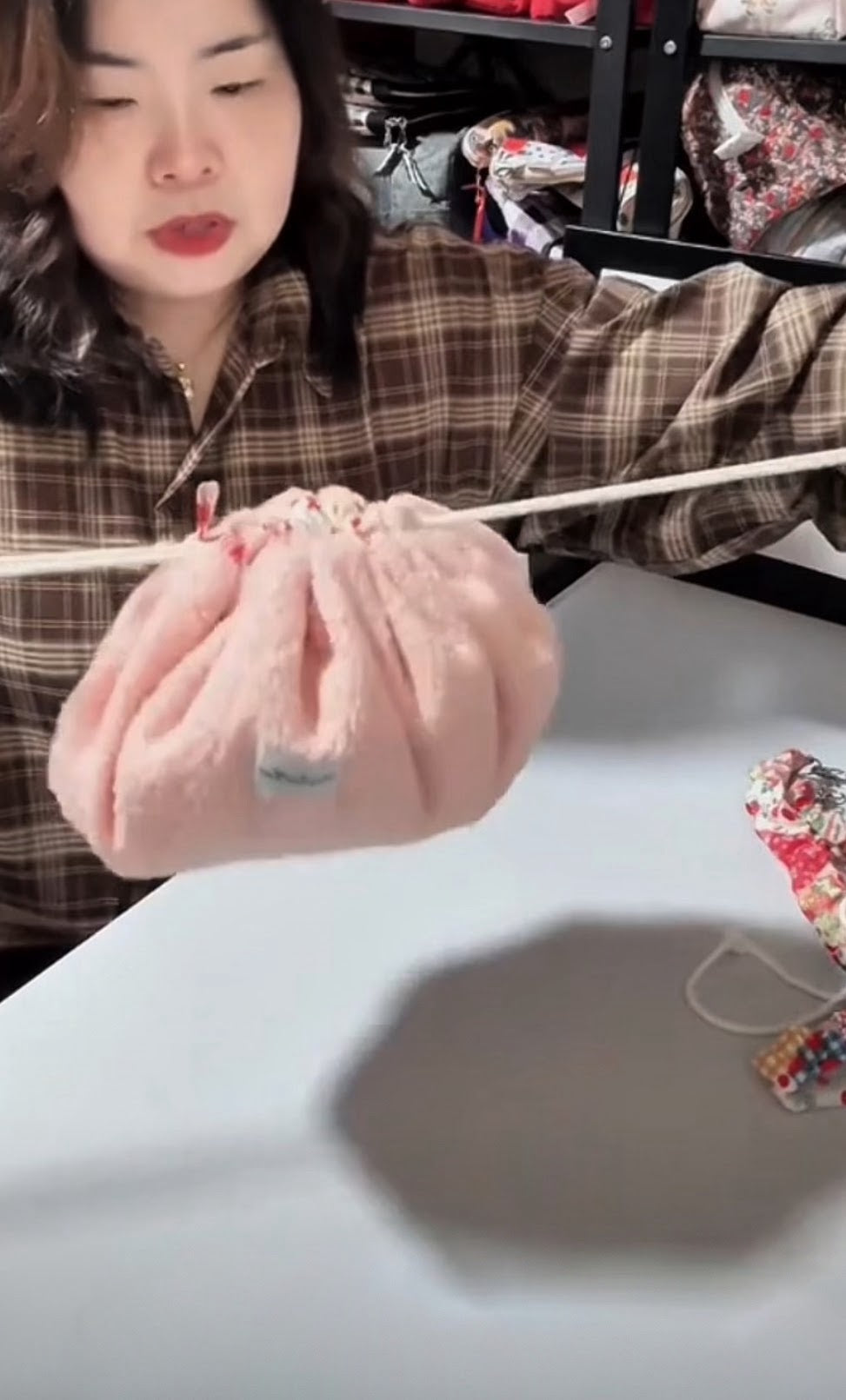 Strawberry Mochi Bag gathered into a closed soft pouch